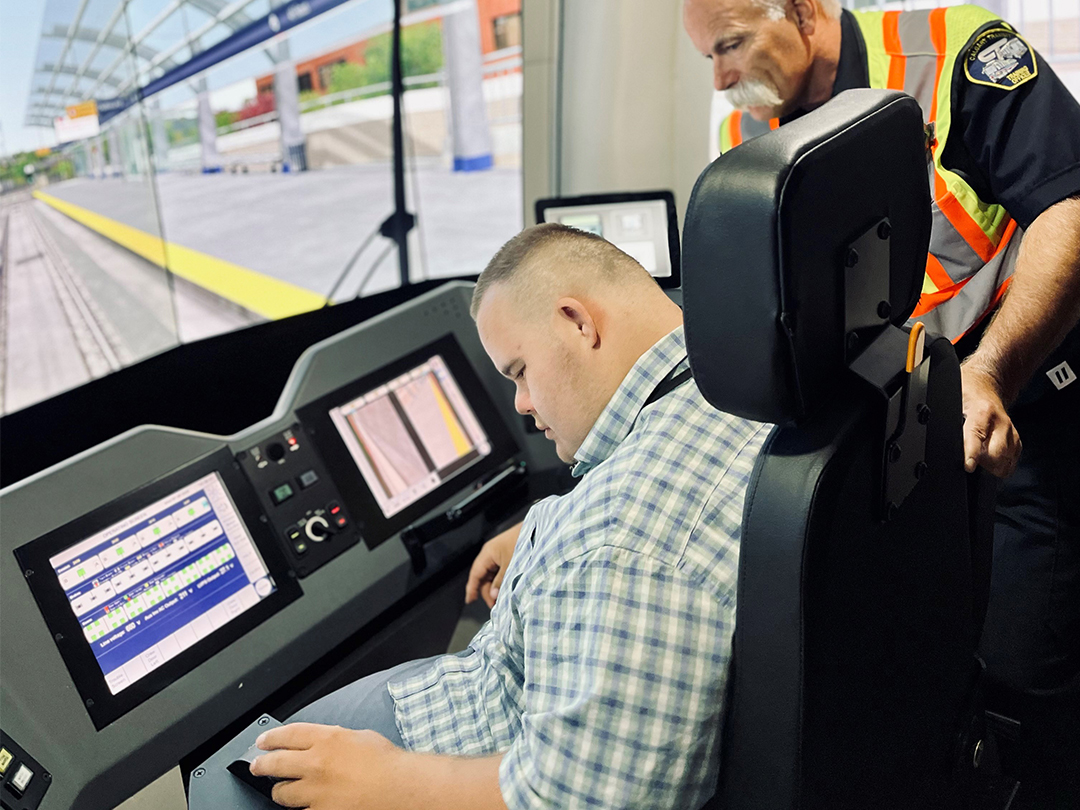 Jerome in the drivers seat learning how CTrains are operated